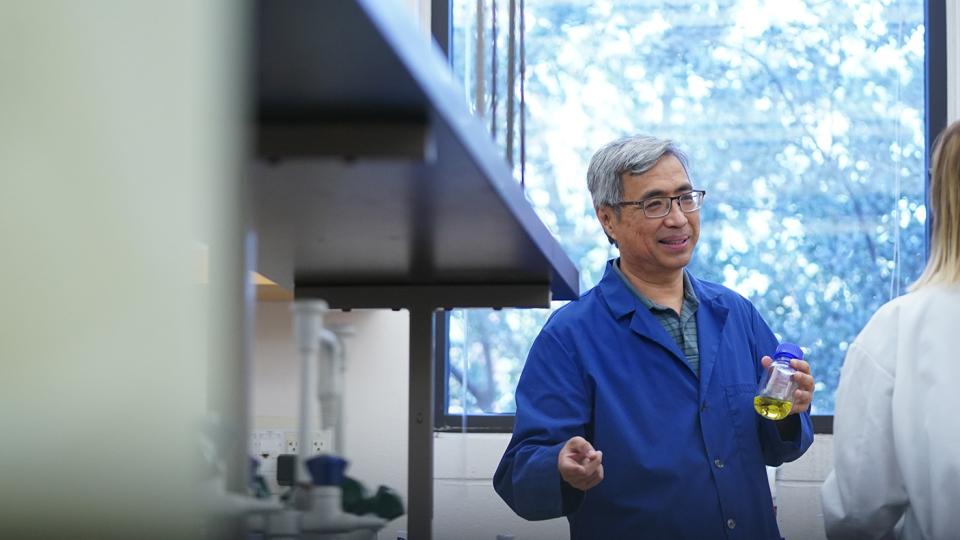 Photo of Ken Cheung in a lab