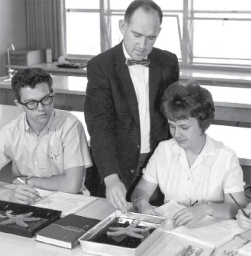 Donald Braun teaching in science classroom