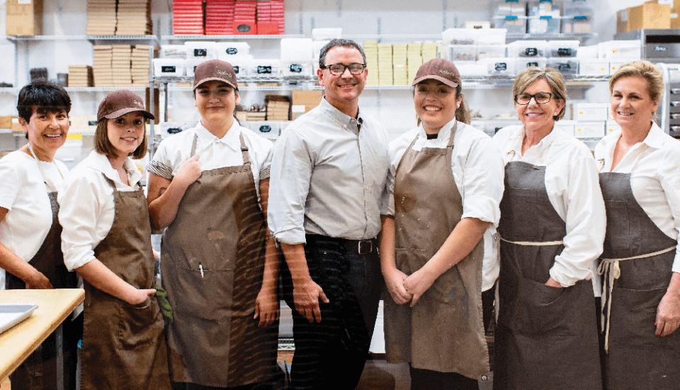 Robert Taylor with Stafford's Chocolates employees