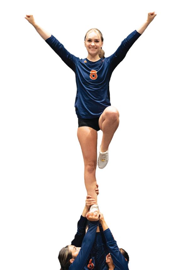 FPU Cheerleader standing on one foot