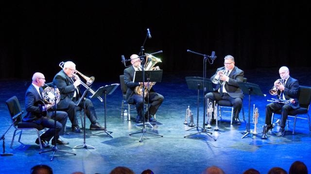 Members of Artisans in Brass, left to right: Rick Nichols, Dave Brown, Corey Dawson, Fred Powell and George Dougherty, D.M.A., FPU director of bands.