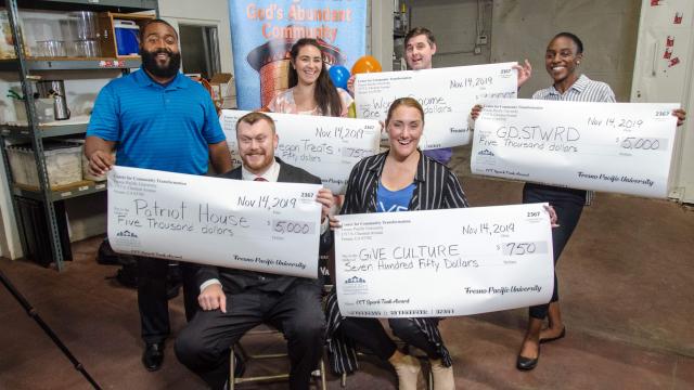 And the winners—big smiles and big checks! From left: Lee Williams and Kevin Kears, Patriot House; Ruby Sultan, Tower Vegan Treats; Matt Coatney, WorkGnome; Shauna Felix, GiVE CULTURE (seated); and Alyssa Ndombeson, GD.STWRD.
