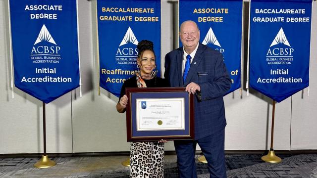 Photo of ACBSP accreditation for FPU