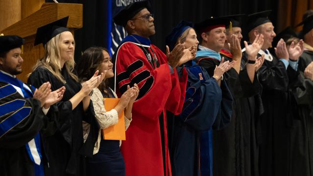 André Stephens, Ph.D., president of Fresno Pacific University, stands with faculty and administrators welcoming new students to begin 2024 Convocation and the school year on the main campus. 