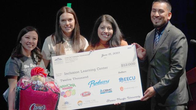 Three women, a man and a big check. Three representatives from Inclusion Learning Center show off their $12,000 prize at the 2023 Spark Tank Pitch Fest. With them at left is Carlos Huerta, executive director of the CCT. 