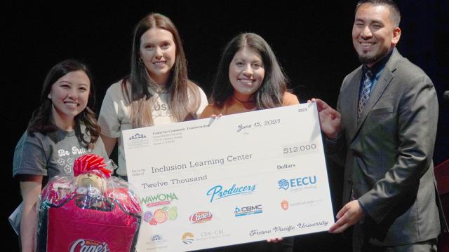 The three founders of Inclusion Learning Center celebrate receiving $12,000, the largest award ever given to one organization, at the Spark Tank EXPO June 15. From left: Gaukue Xiong, Melissa Bertao and Monica Peterson with Carlos Huerta, executive director of the FPU Center for Community Transformation. 