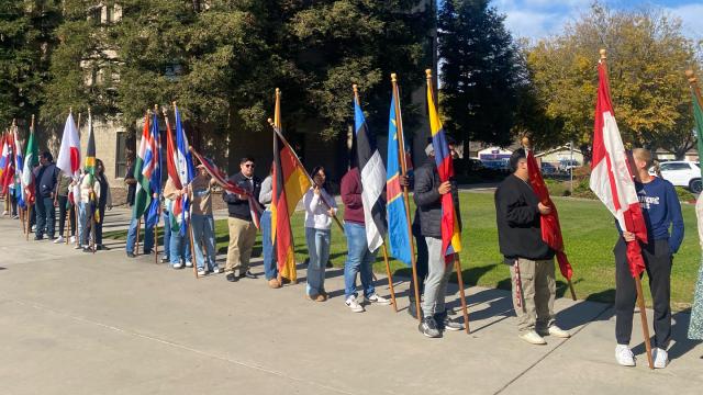 Flag carriers line up outside the FPU Special Events Center for the Thanksgiving Celebration Luncheon 