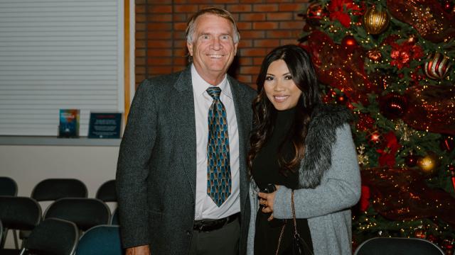 Gary Gramenz and Marie Celine Roque at the December 2022 Outstanding Graduate Ceremony