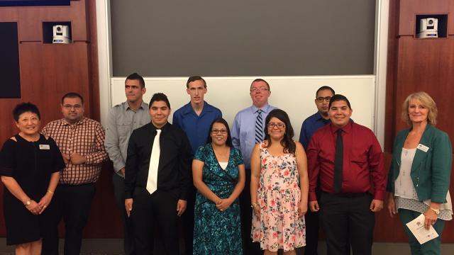 Interns and FPU Continuing Education officials celebrate graduation.