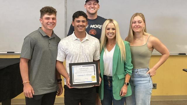 Scholarship winners, students and the presenter: (from left) Turner Pruitt, Tommy Rover, Grant Highstreet (rear), Kaysi Curtin and Felicia Dourva.