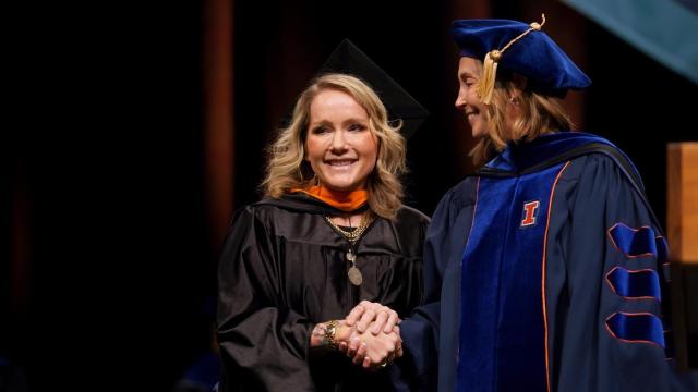 2025 NETA winner Joanna Crocker (left) at FPU Provost Alison R. Noble at commencement.