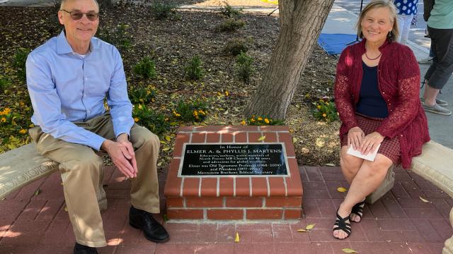 Lauren Friesen and Fran Martens Friesen try out the conversation space at Fresno Pacific Biblical Seminary, on the Fresno Pacific University main campus, that honors their parents, Elmer and Phyllis Martens, following the dedication ceremony.