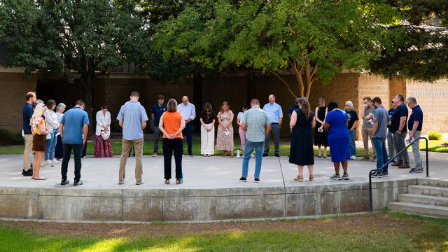 FPU staff and faculty gather to pray over the upcoming school year.