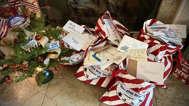 Bags of Christmas cards for veterans amid Christmas decorations