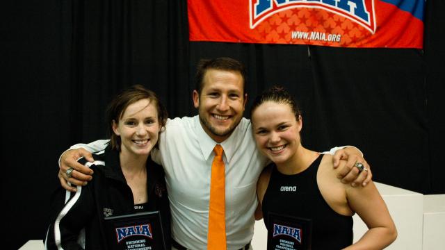Pete Richardson with Sunbirds Stacy Carter and Kendall Swanson at the NAIA national championships