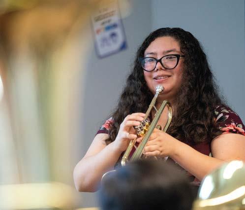 Delilah Ovalie playing the trumpet